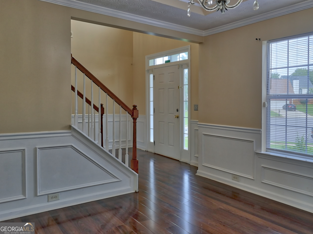 512 Chaucer Way Stockbridge, GA 30281 - Photo 5 of 25 a view of entryway with stairs and wooden floor