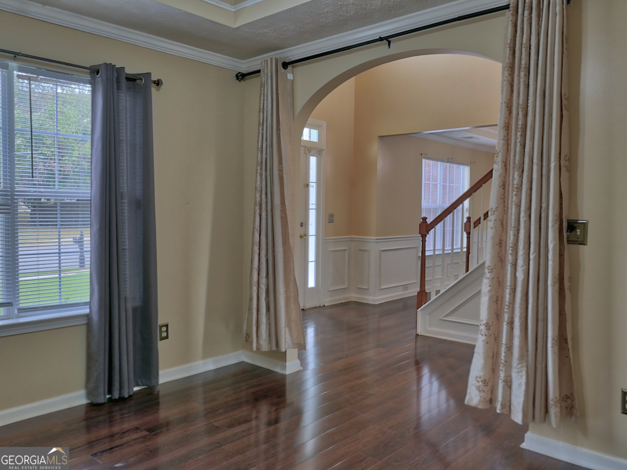 512 Chaucer Way Stockbridge, GA 30281 - Photo 7 of 25 a view of entryway with wooden floor