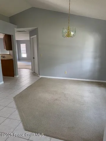 a view of livingroom with hardwood floor and a ceiling fan
