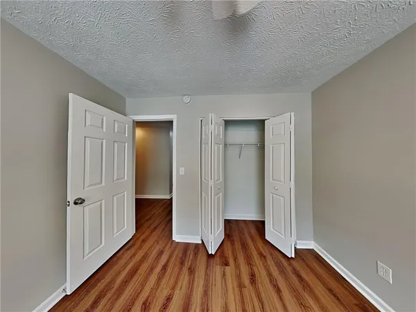a view of a livingroom with wooden floor