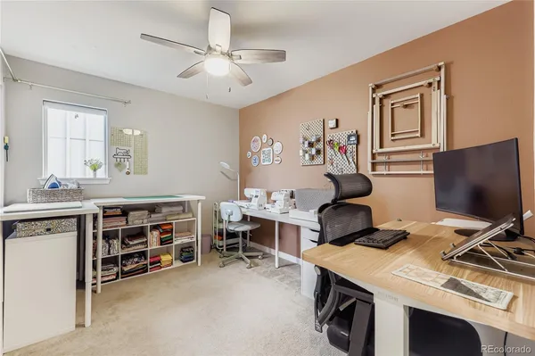 a room with furniture a desk and chair