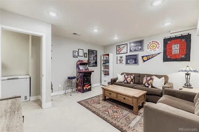 a living room with furniture and a couch