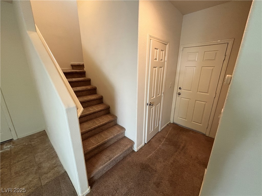 4512 Townwall Street Las Vegas, NV 89115 - Photo 13 of 56 Stairway featuring carpet flooring