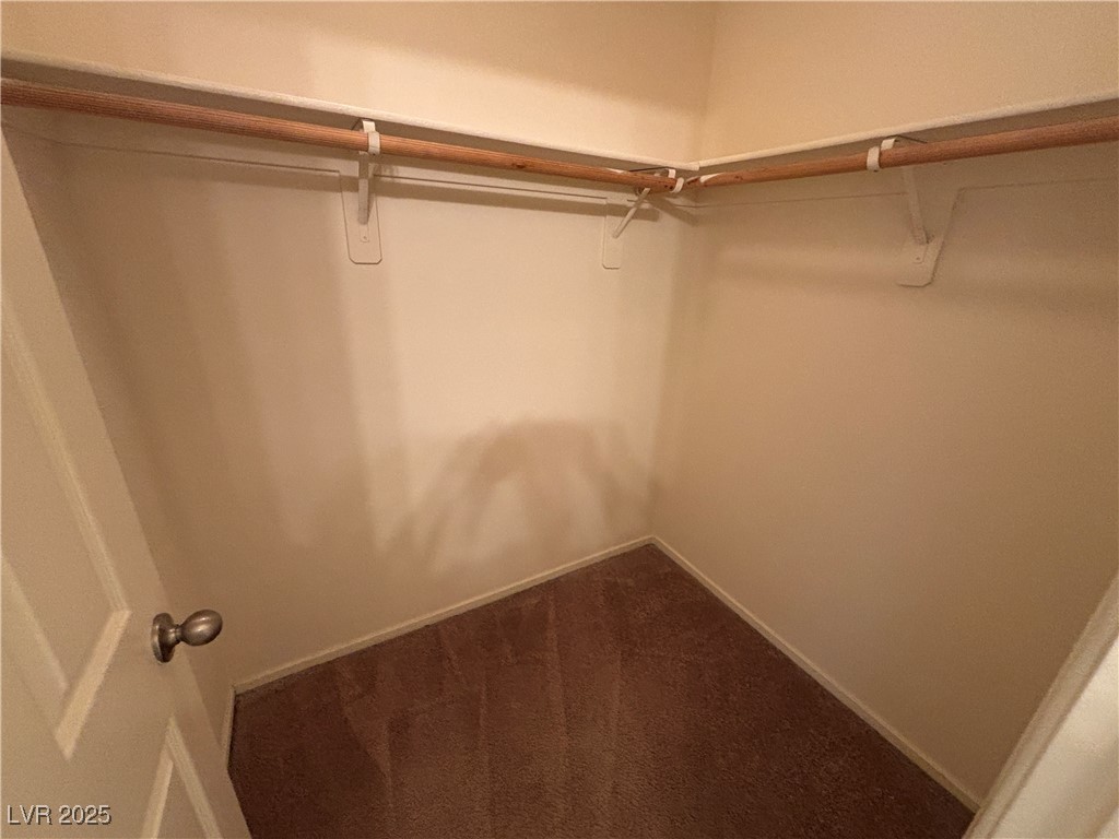 4512 Townwall Street Las Vegas, NV 89115 - Photo 32 of 56 Spacious closet featuring carpet
