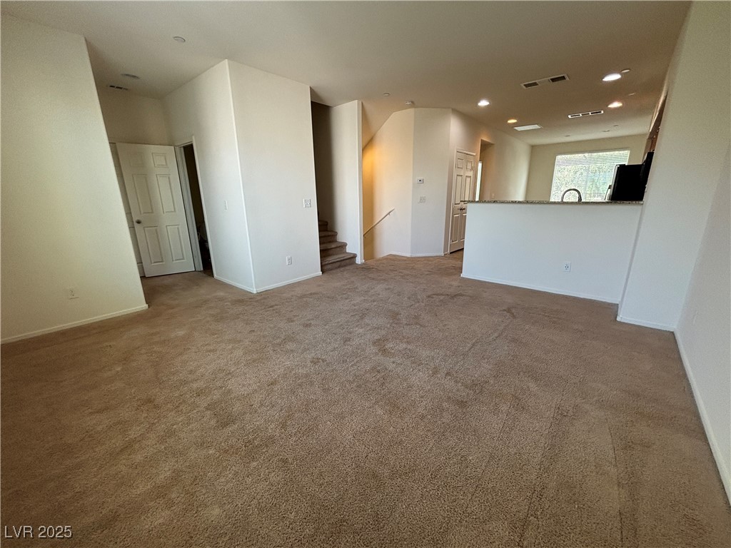4512 Townwall Street Las Vegas, NV 89115 - Photo 35 of 56 Carpeted empty room with recessed lighting and baseboards