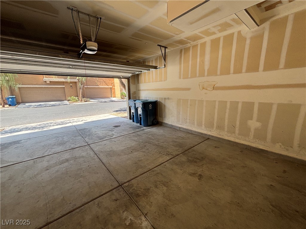4512 Townwall Street Las Vegas, NV 89115 - Photo 8 of 56 Garage with a garage door opener