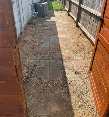 a view of backyard with barn and entertaining space