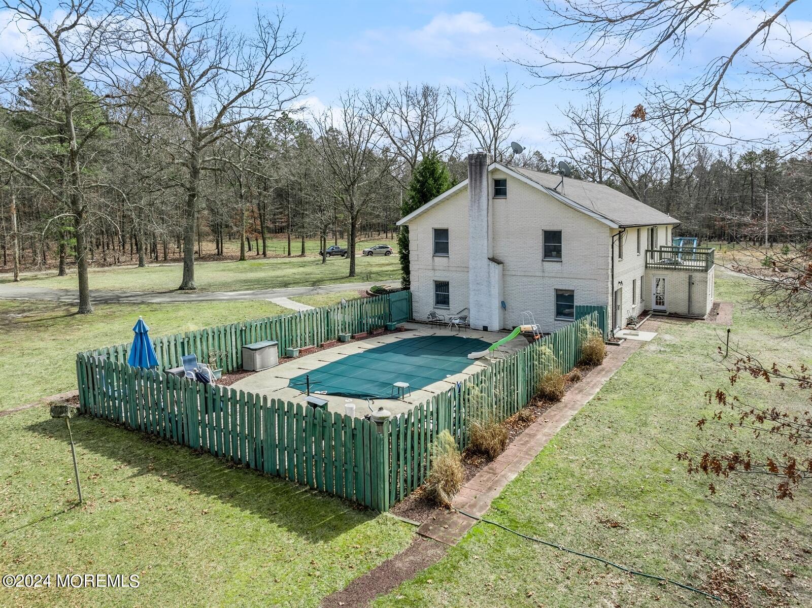 105 Buckingham Road Whiting, NJ 08759 - Photo 2 of 59 a view of a house with a yard and pathway