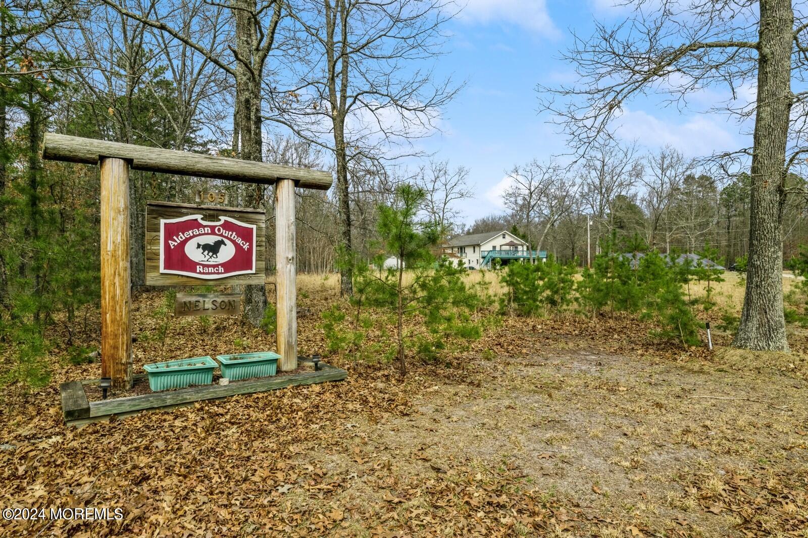 105 Buckingham Road Whiting, NJ 08759 - Photo 3 of 59 a sign that is on the side of the road