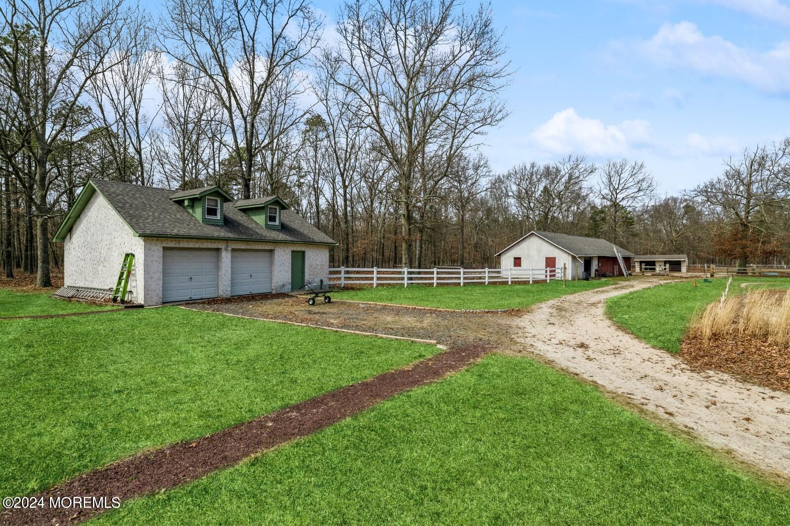 105 Buckingham Road Whiting, NJ 08759 - Photo 32 of 59 a view of a house with backyard and garden
