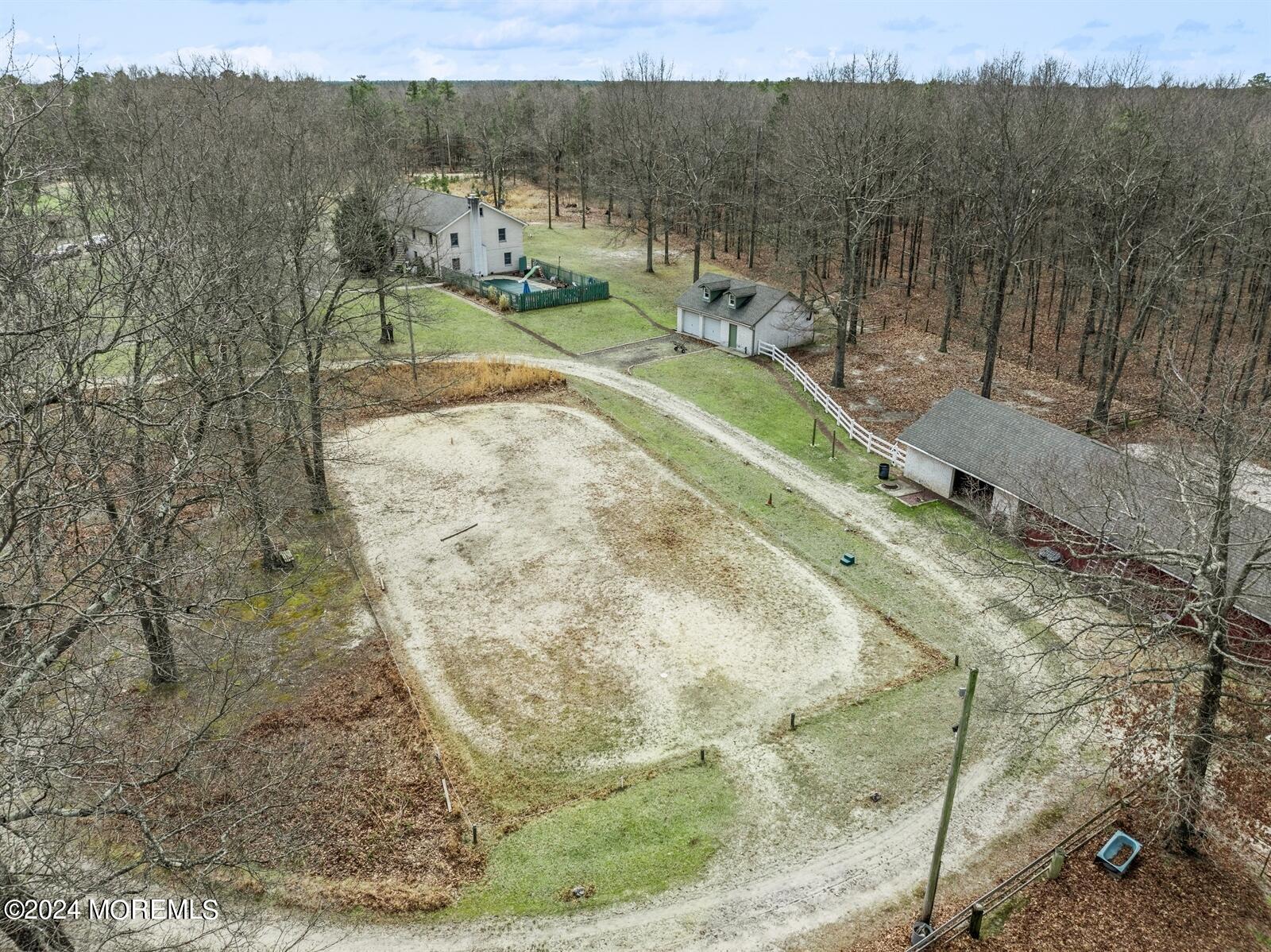 105 Buckingham Road Whiting, NJ 08759 - Photo 47 of 59 a view of a swimming pool with a yard