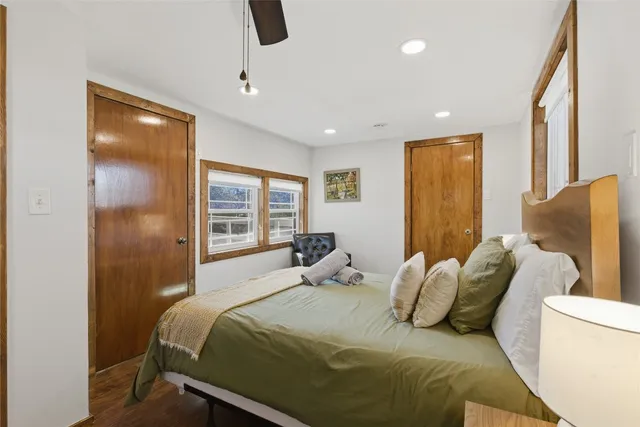 a view of a balcony with wooden floor and outdoor space