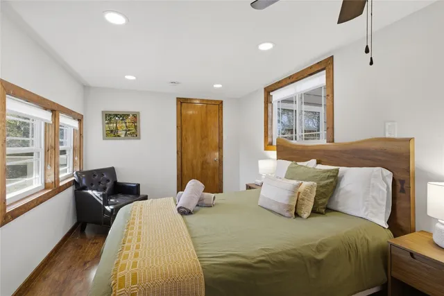 a view of a wooden door with a tree