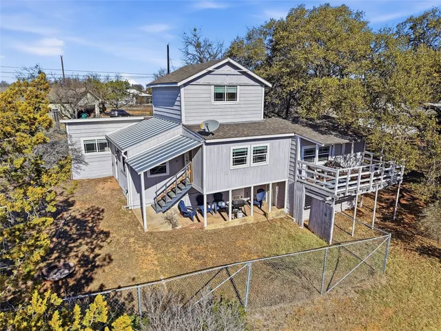 a view of a wooden bench sitting in a chair