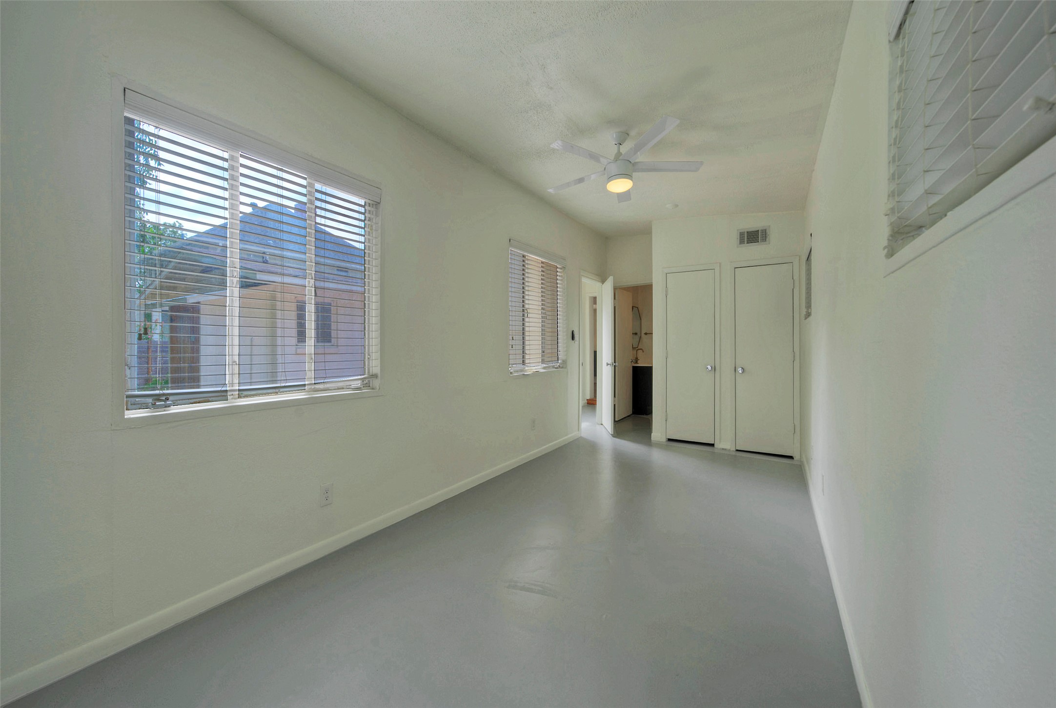 1803 Pearl Street Austin, TX 78701 - Photo 19 of 33 a view of an empty room with a window