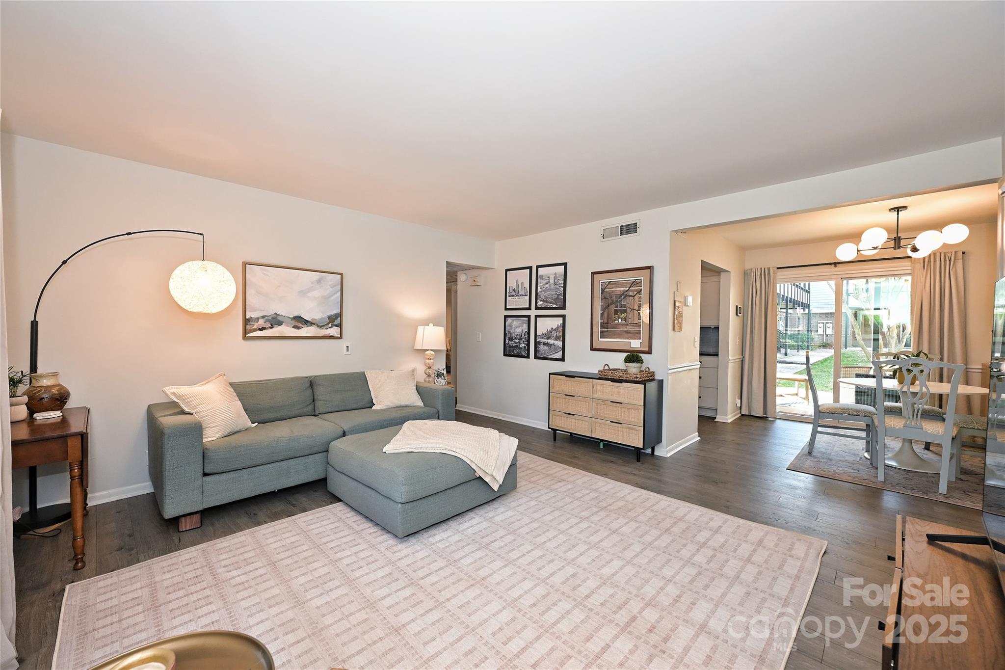 2604 Park Road, Unit B Charlotte, NC 28209 - Photo 5 of 21 a living room with furniture and a large window