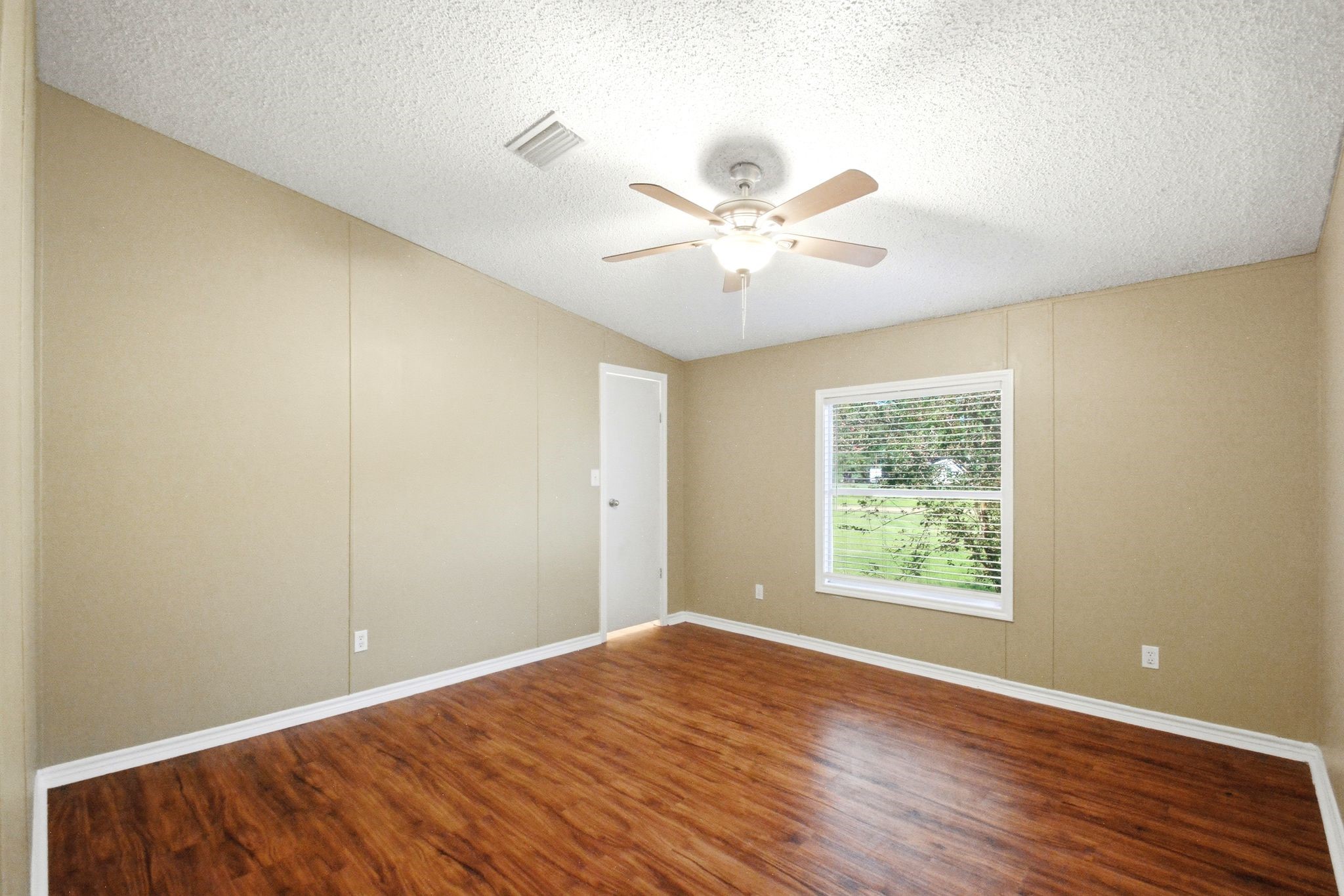 290 Monticello Street Trinity, TX 75862 - Photo 22 of 36 Spacious Secondary Bedroom with Natural Light