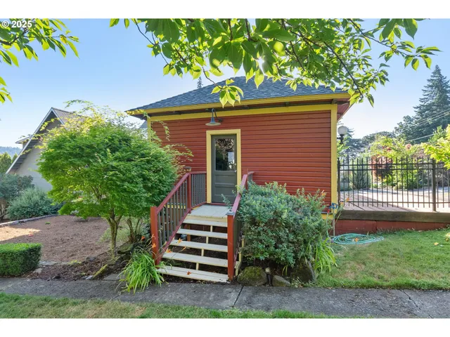 a backyard of a house with lots of green space