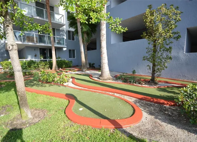 a view of a house with swimming pool