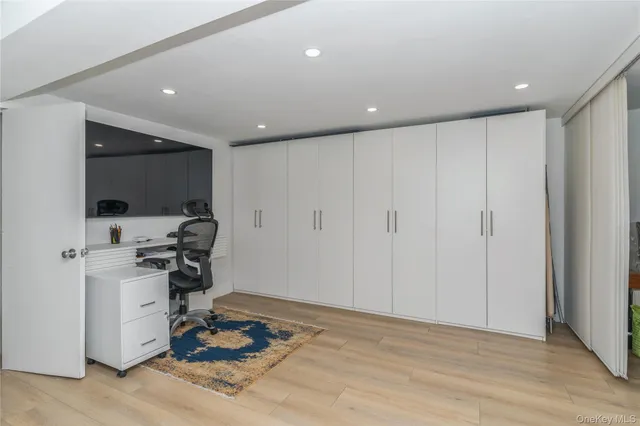 a view of a workspace with furniture