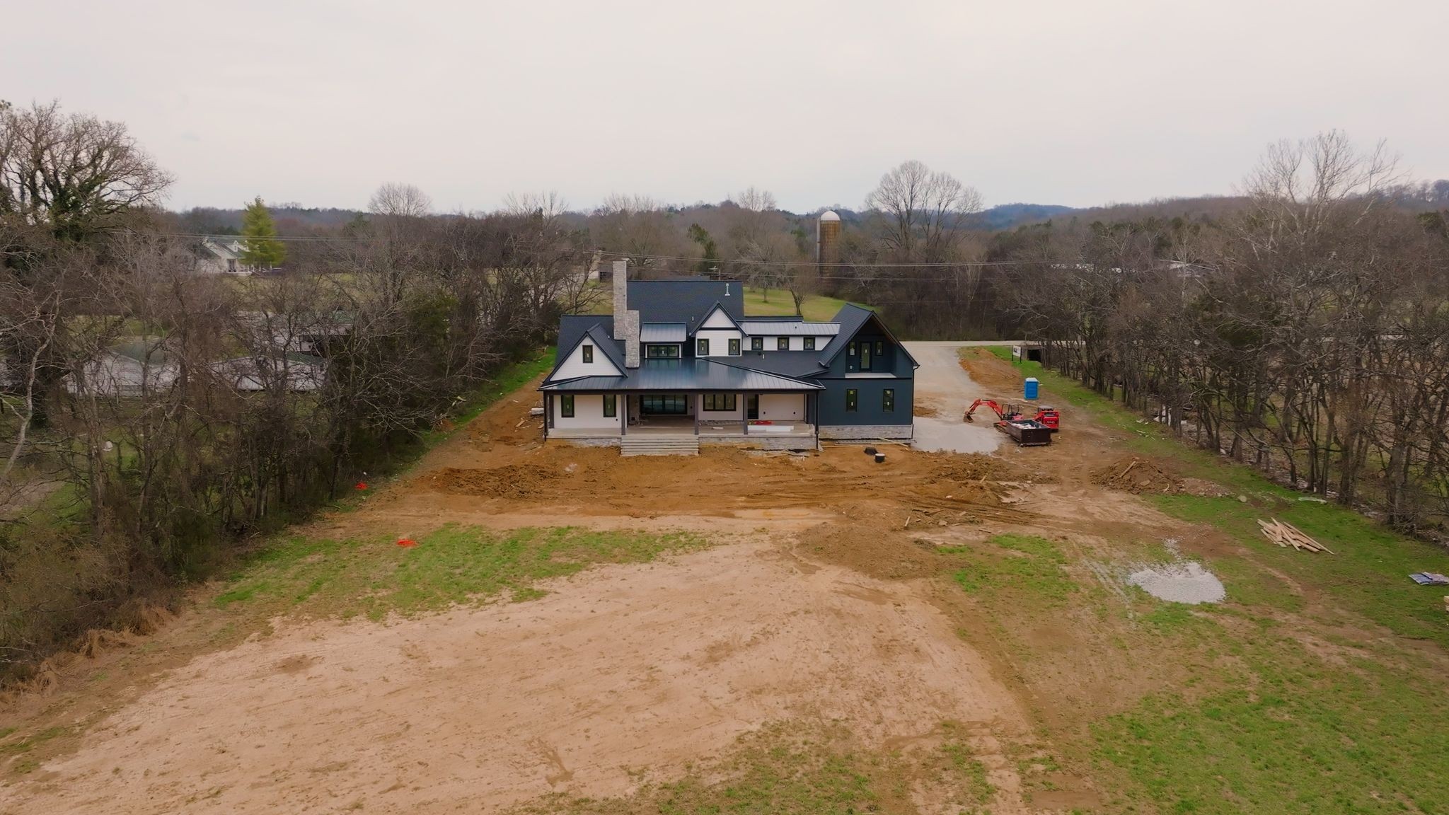 6801 Flat Creek Road College Grove, TN 37046 - Photo 18 of 20 a view of a outdoor space with garden and trees