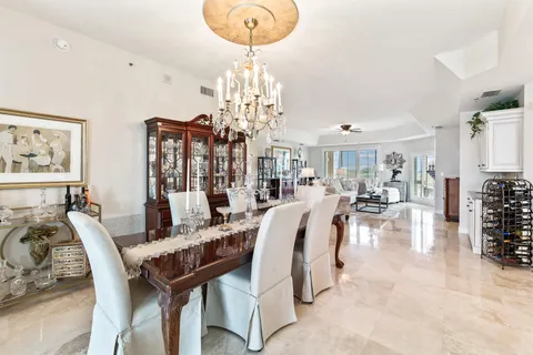a living room with furniture fireplace and a flat screen tv
