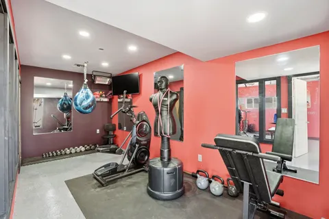 a view of a room with gym equipment