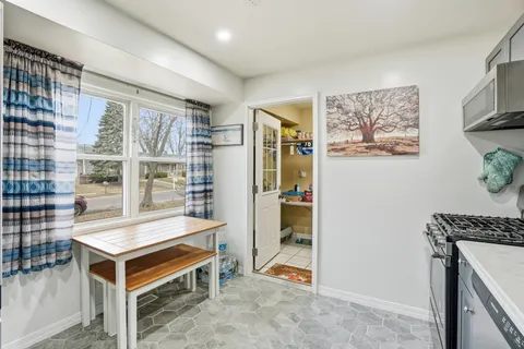 a room with furniture and a window
