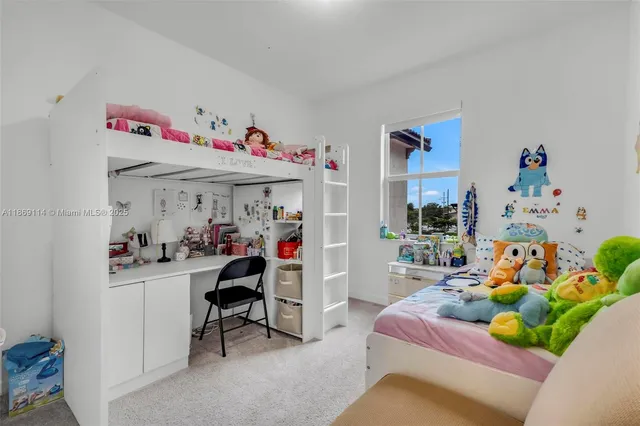 a bedroom with baby toys and a baby crib