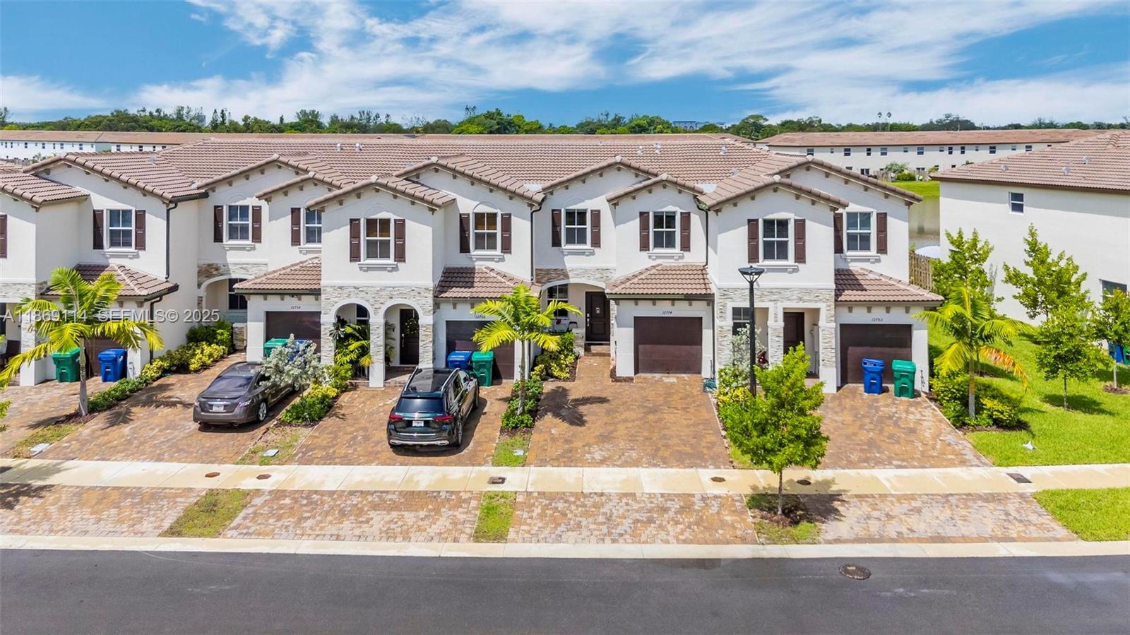 12774 Northwest 22nd Place Miami, FL 33167 - Photo 22 of 32 a front view of house with yard