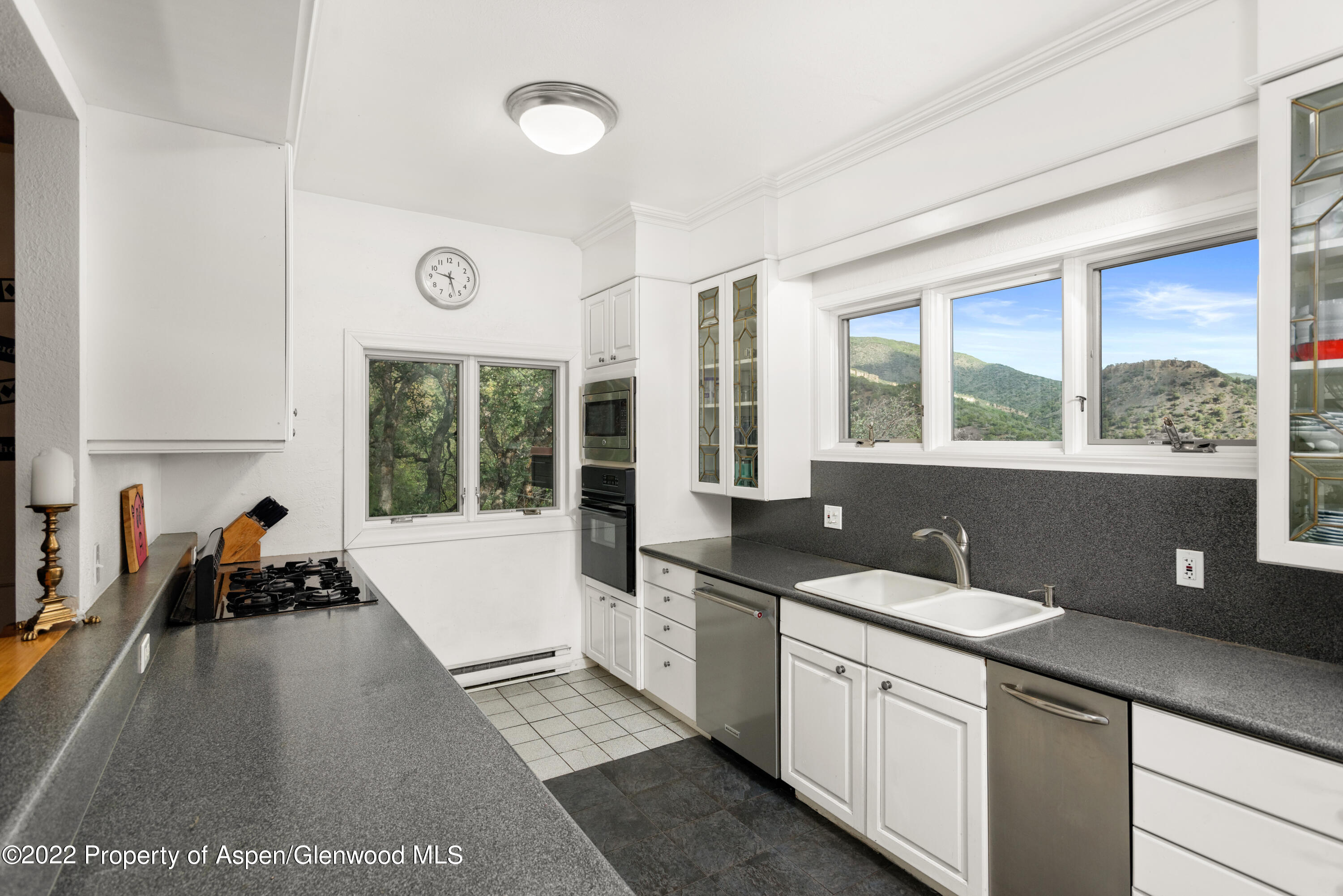 540 Upper Ranch Road Aspen, CO 81611 - Photo 4 of 24 a kitchen with a sink and large windows