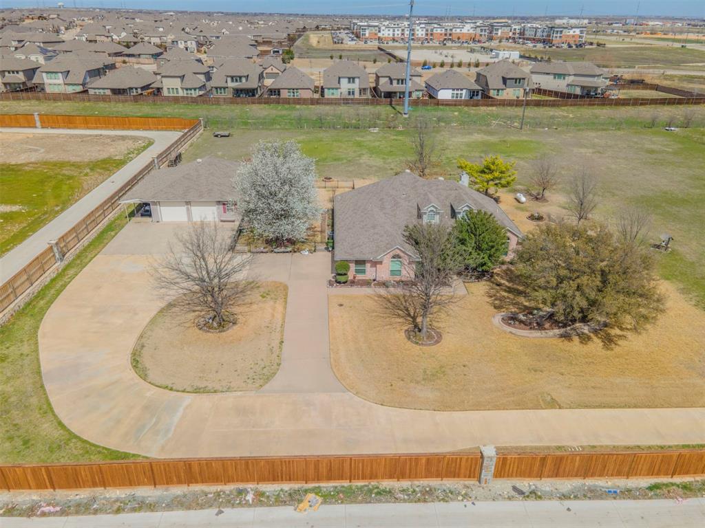 11621 Willow Springs Road Fort Worth, TX 76052 - Photo 26 of 35 an aerial view of a house with outdoor space
