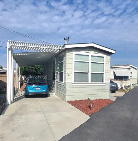 a front view of a house with a garage