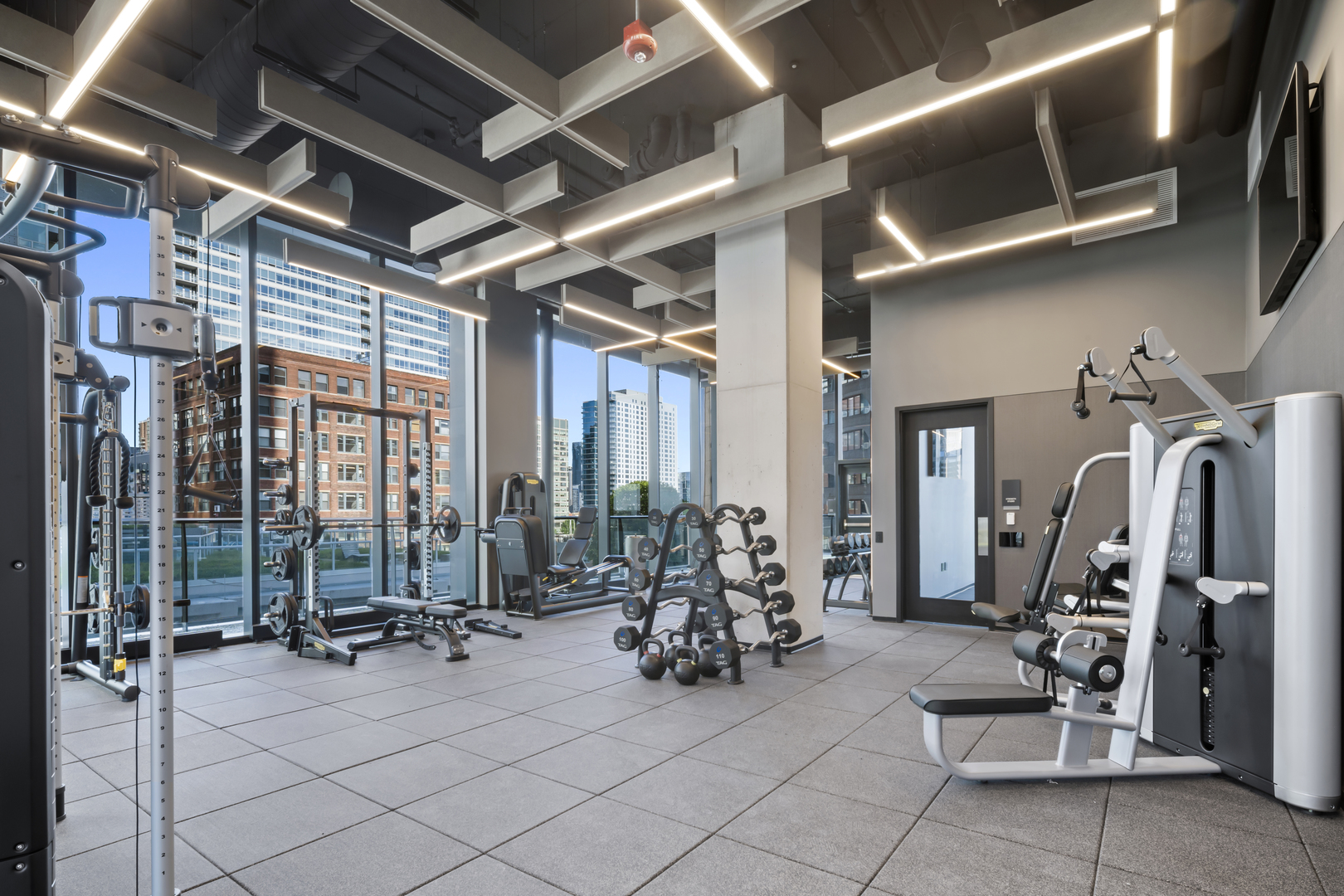 234 West Polk Street, Unit 2708 Chicago, IL 60607 - Photo 14 of 16 a view of a room with gym equipment