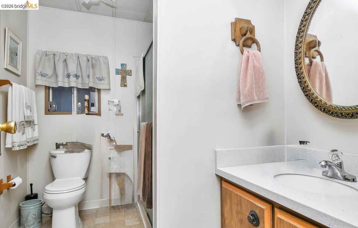 4603 Balfour Road, Unit 86 Brentwood, CA 94513 - Photo 17 of 24 Bathroom featuring a shower stall and vanity