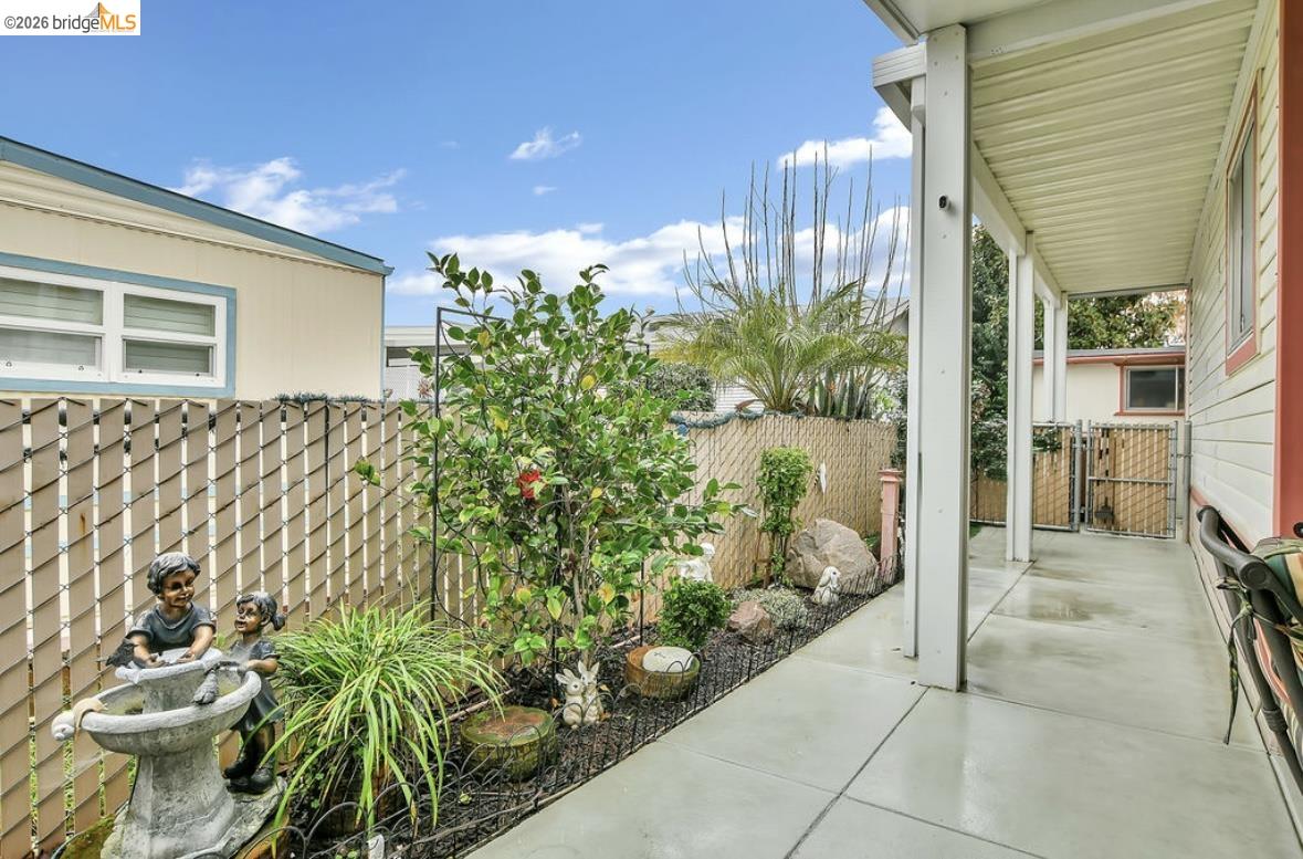 4603 Balfour Road, Unit 86 Brentwood, CA 94513 - Photo 20 of 24 Fenced backyard featuring a gate
