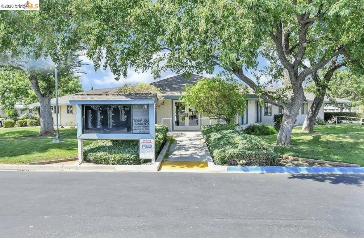 4603 Balfour Road, Unit 86 Brentwood, CA 94513 - Photo 24 of 24 View of front of house with french doors and a front yard
