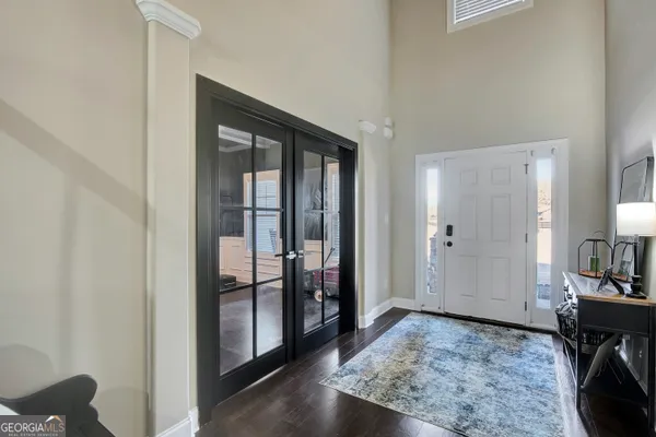 a living room with furniture flat screen tv and a fireplace