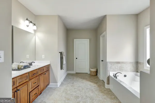 a view of a livingroom with furniture and windows