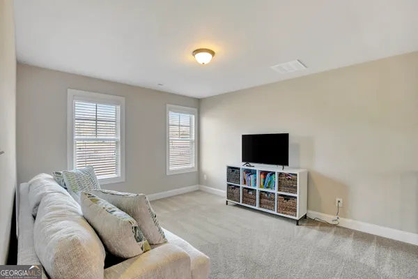 a view of kids room with toys