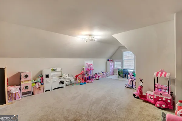 a bedroom with a bed and closet