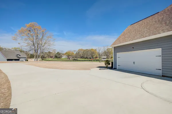 front view of a house with a street