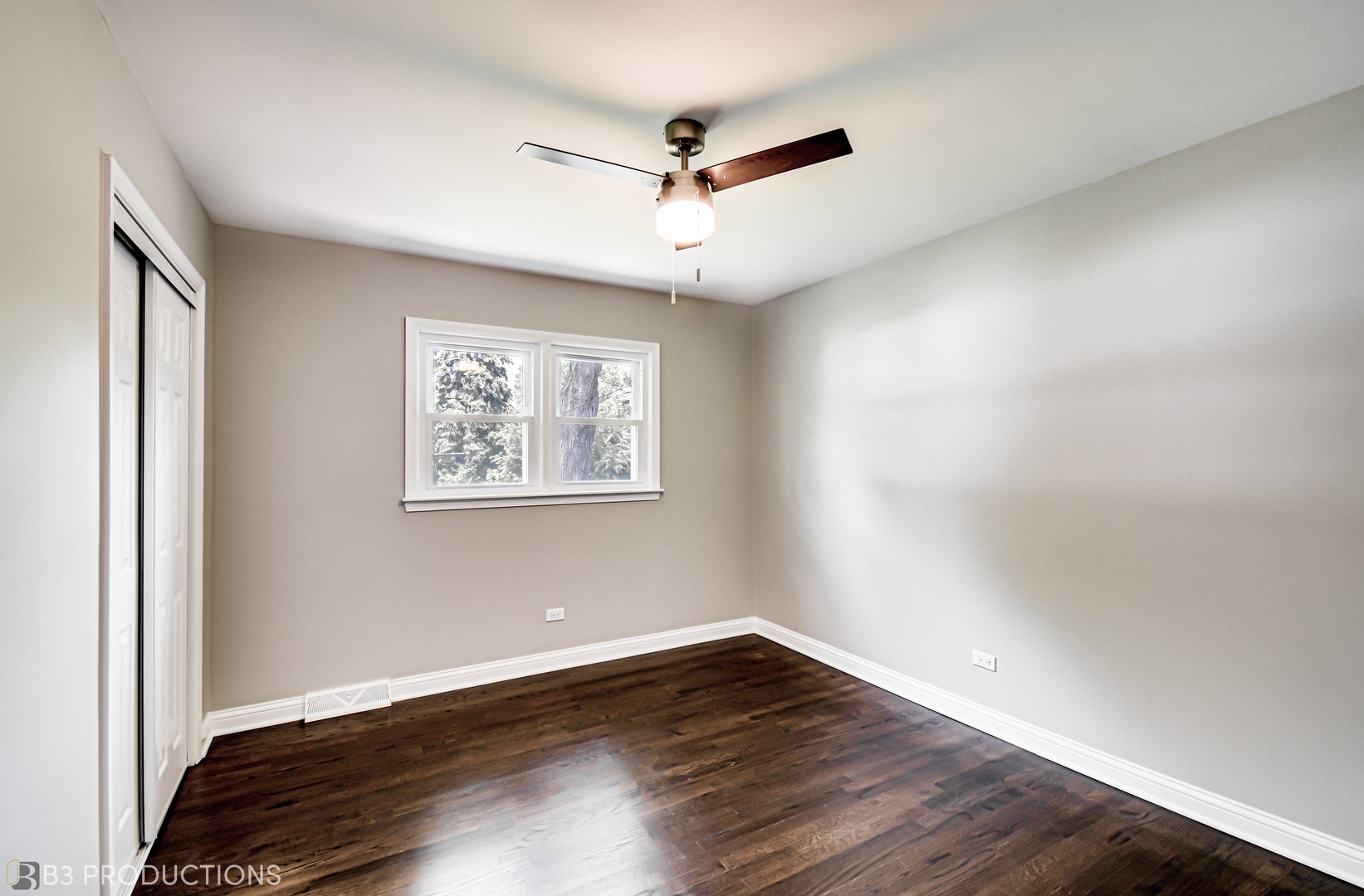 719 Jefferson Street Crete, IL 60417 - Photo 12 of 14 wooden floor in an empty room with a window
