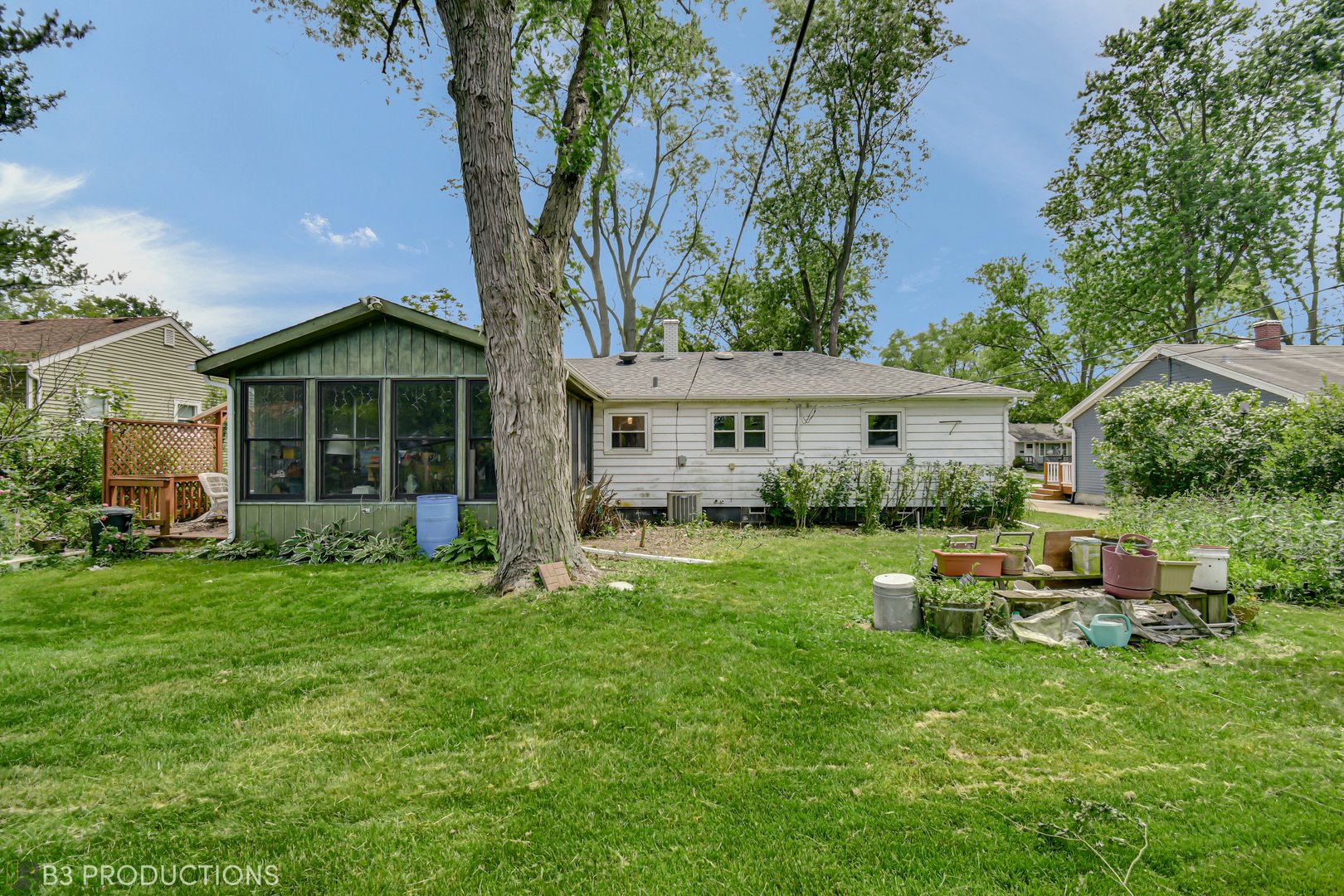 719 Jefferson Street Crete, IL 60417 - Photo 14 of 14 a front view of a house with a garden