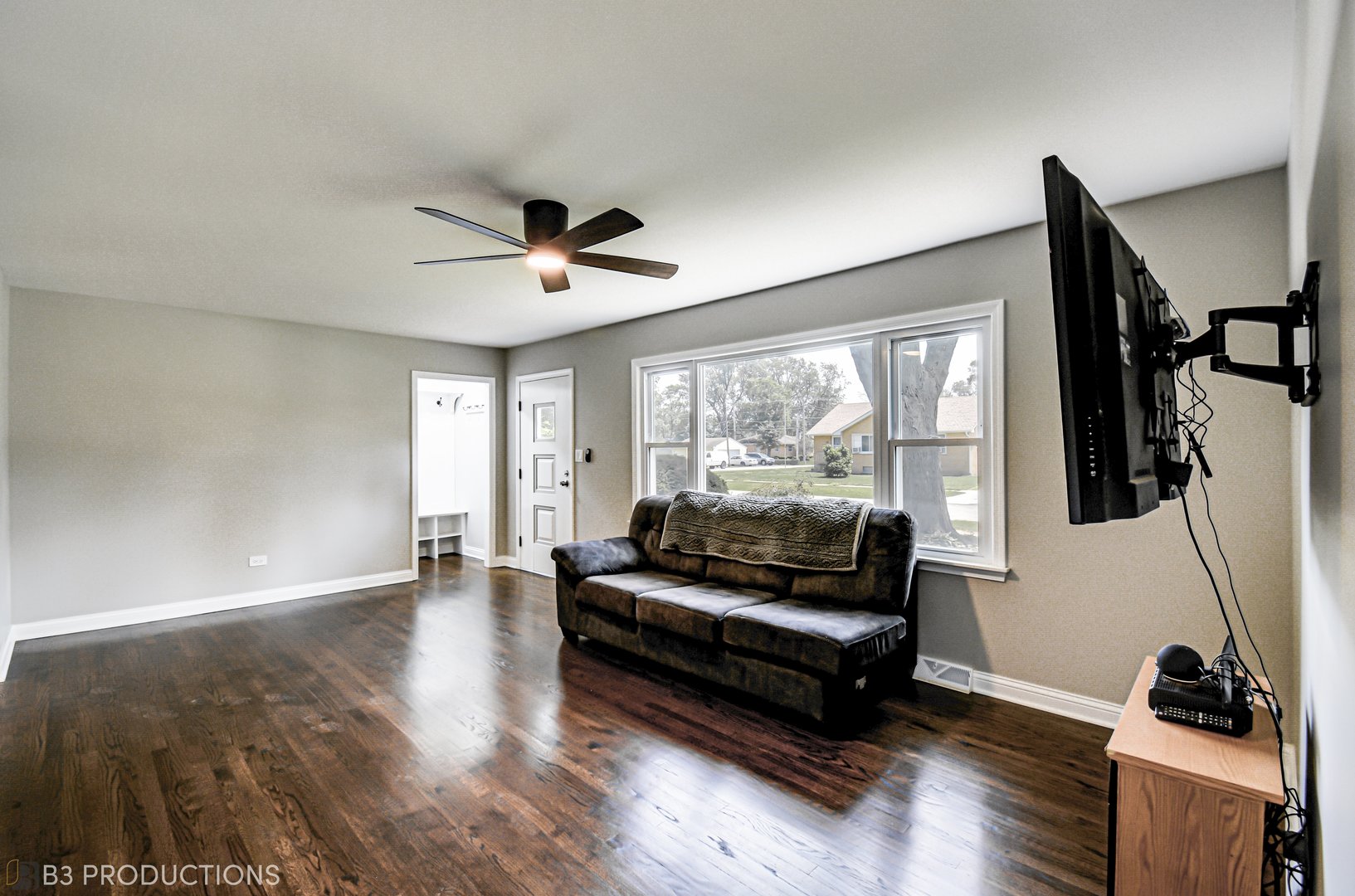 719 Jefferson Street Crete, IL 60417 - Photo 2 of 14 a living room with furniture and a large window