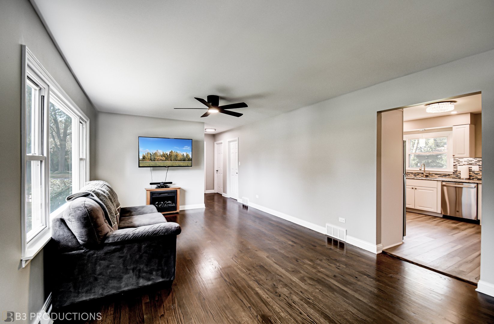 719 Jefferson Street Crete, IL 60417 - Photo 3 of 14 a living room with furniture and a large window