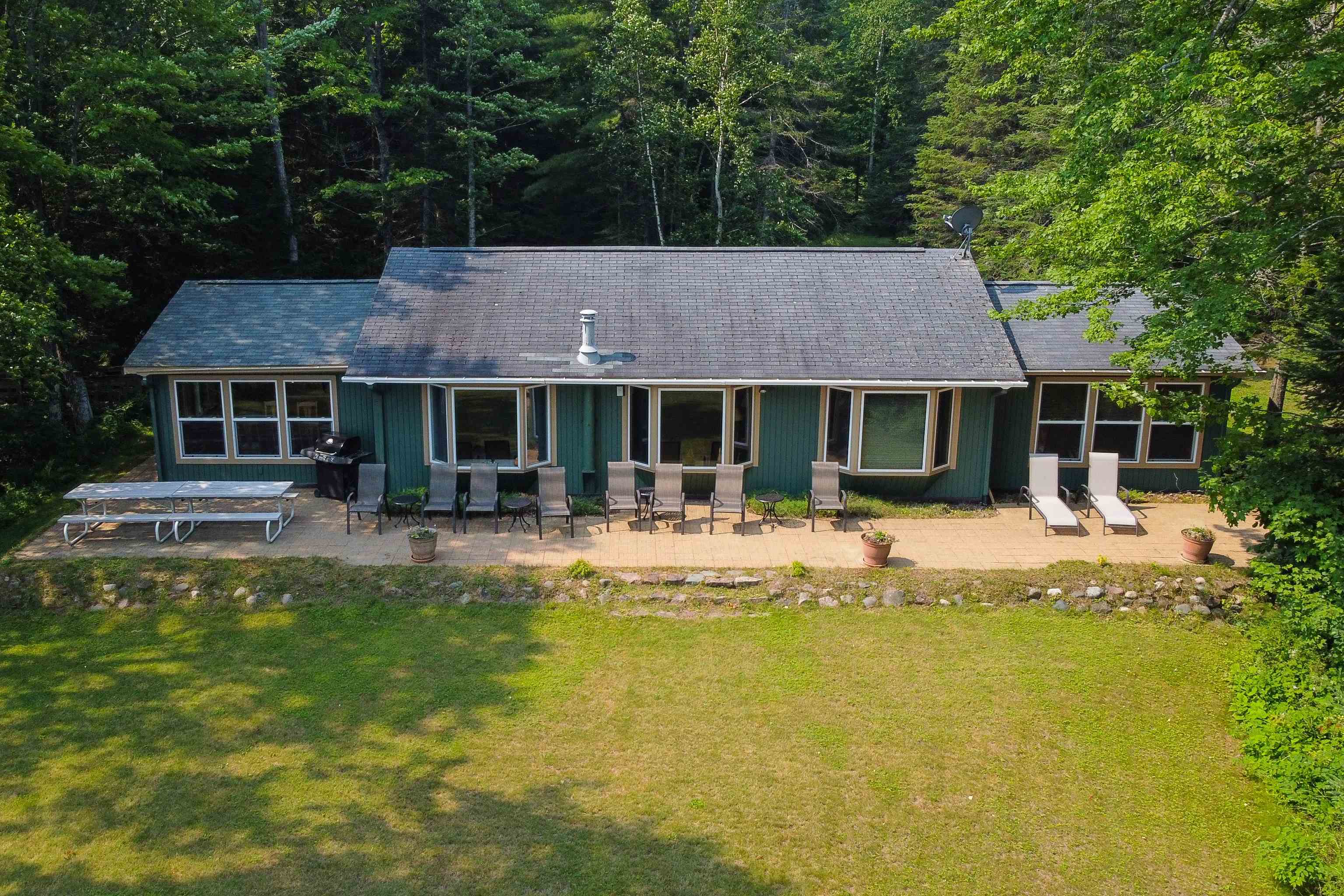 78210 Singer Road Washburn, WI 54891 - Photo 4 of 42 Back Patio of Main House w/Views of the Lake