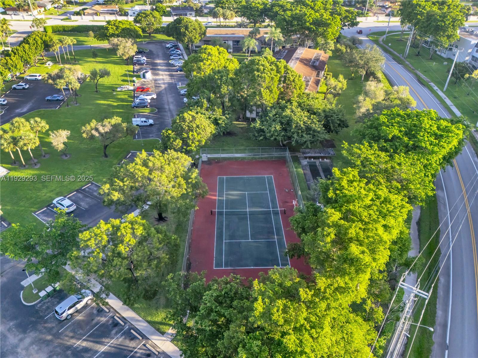 9415 West McNab Road, Unit 204 Tamarac, FL 33321 - Photo 17 of 20 a view of a garden with a flower