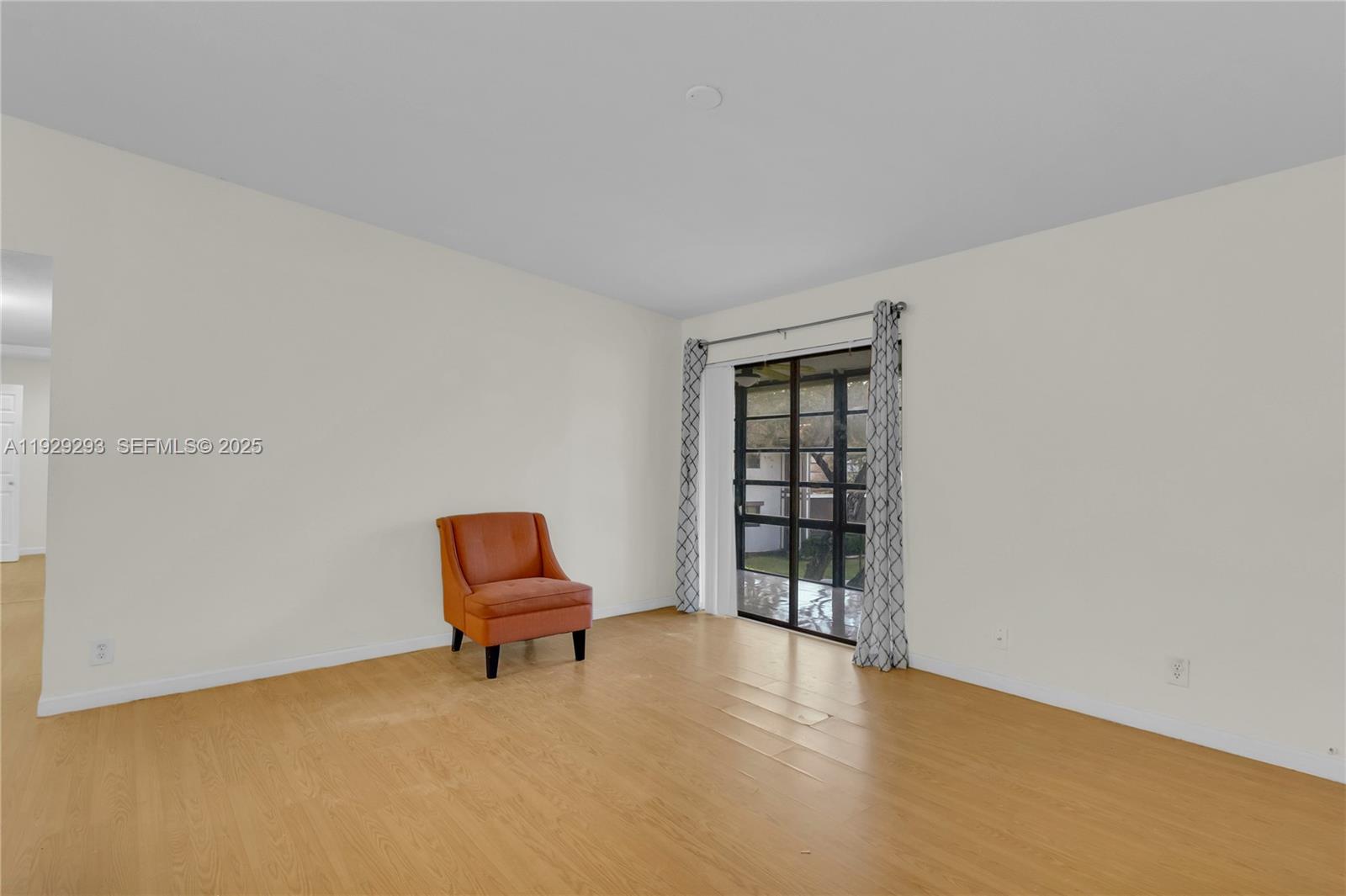 9415 West McNab Road, Unit 204 Tamarac, FL 33321 - Photo 2 of 20 a living room with furniture and gym equipment