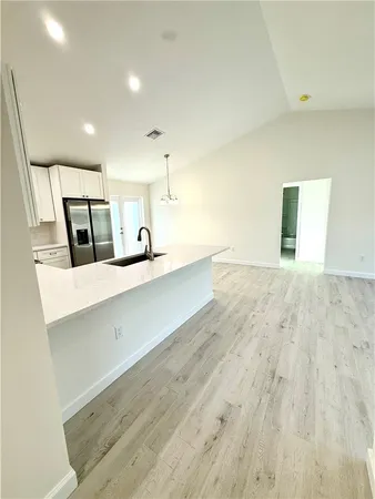 a large bathroom with a large mirror